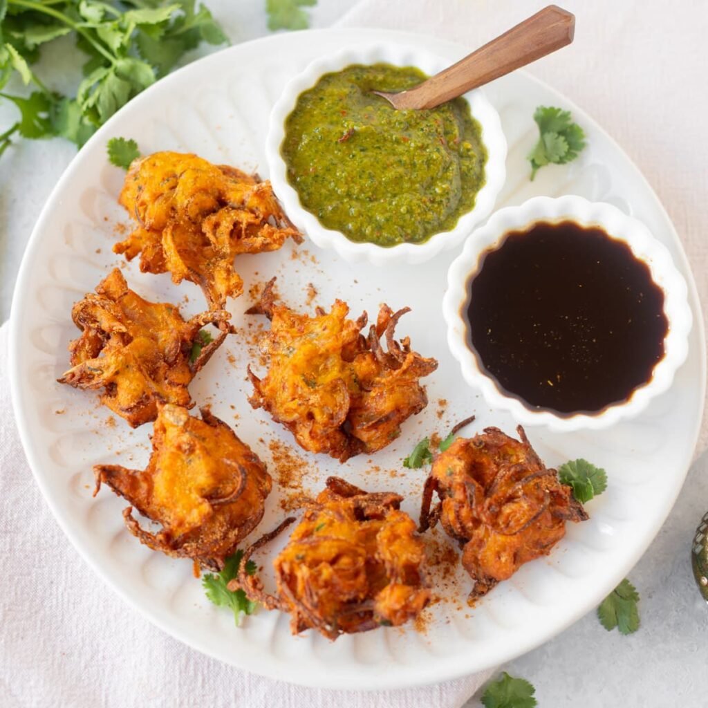 Onion Bhaji. Kanda bhajiya Piping Pot Curry Saagar Restaurant