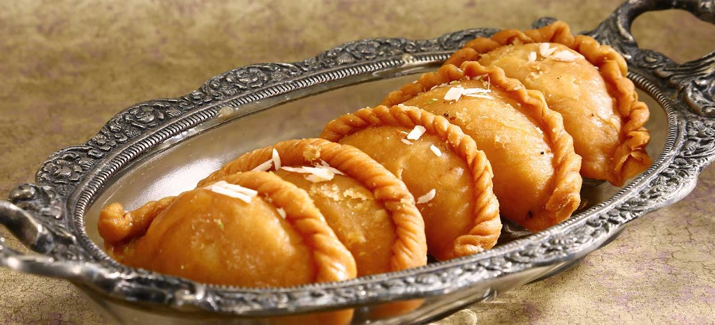 Ghooghra: A Traditional Indian Sweet with a Crispy, Flavorful Filling 1 image 12 Saagar Restaurant